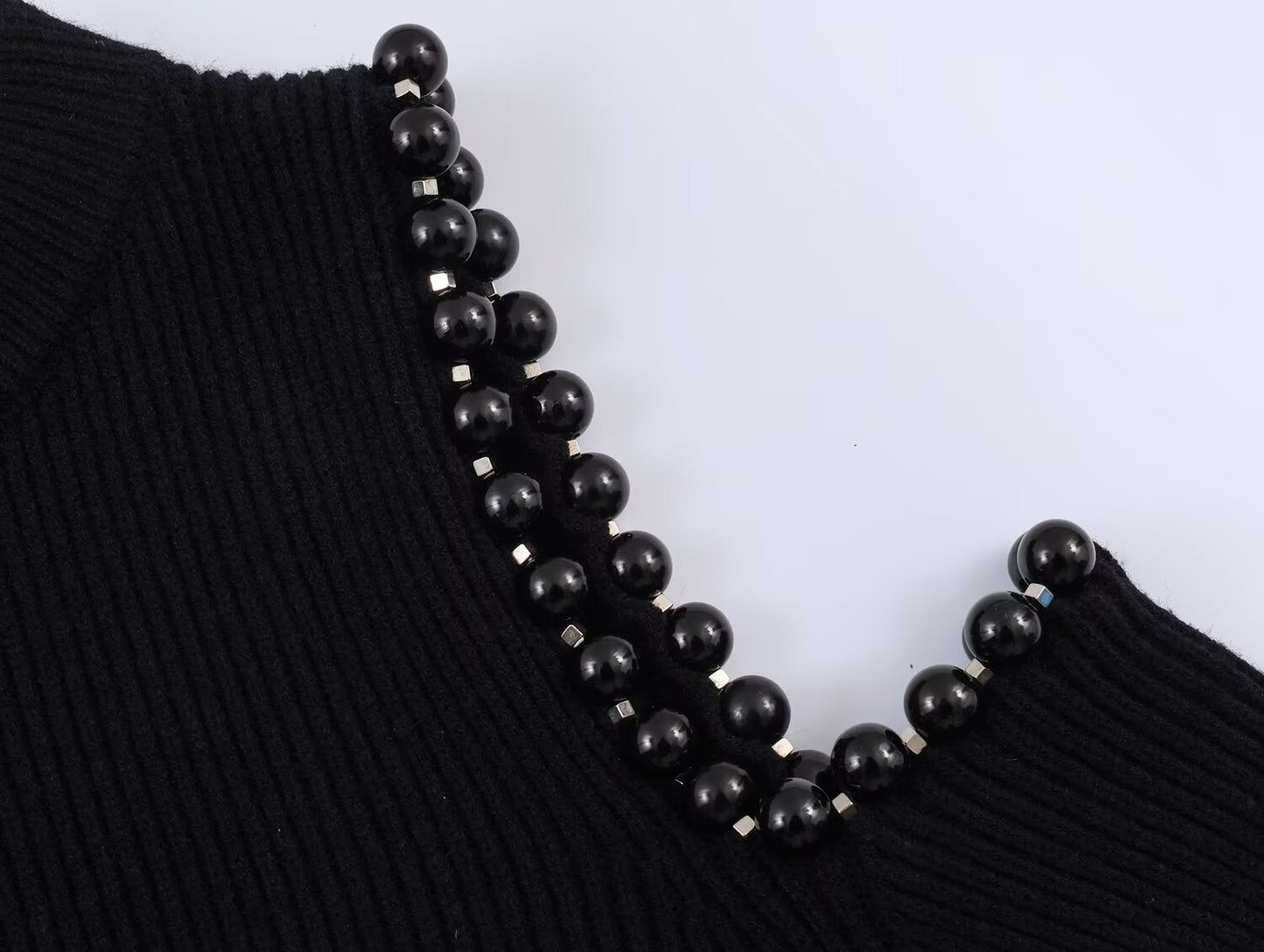 Women's hollow ball decoration O Neck knitted sweater