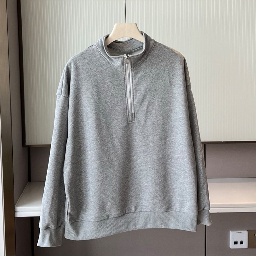 Women's new loose sweater with stand-up collar and half zipper design