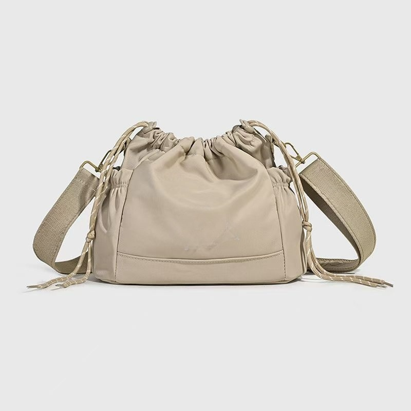Women's new Joker drawstring wide shoulder strap crossbody bag