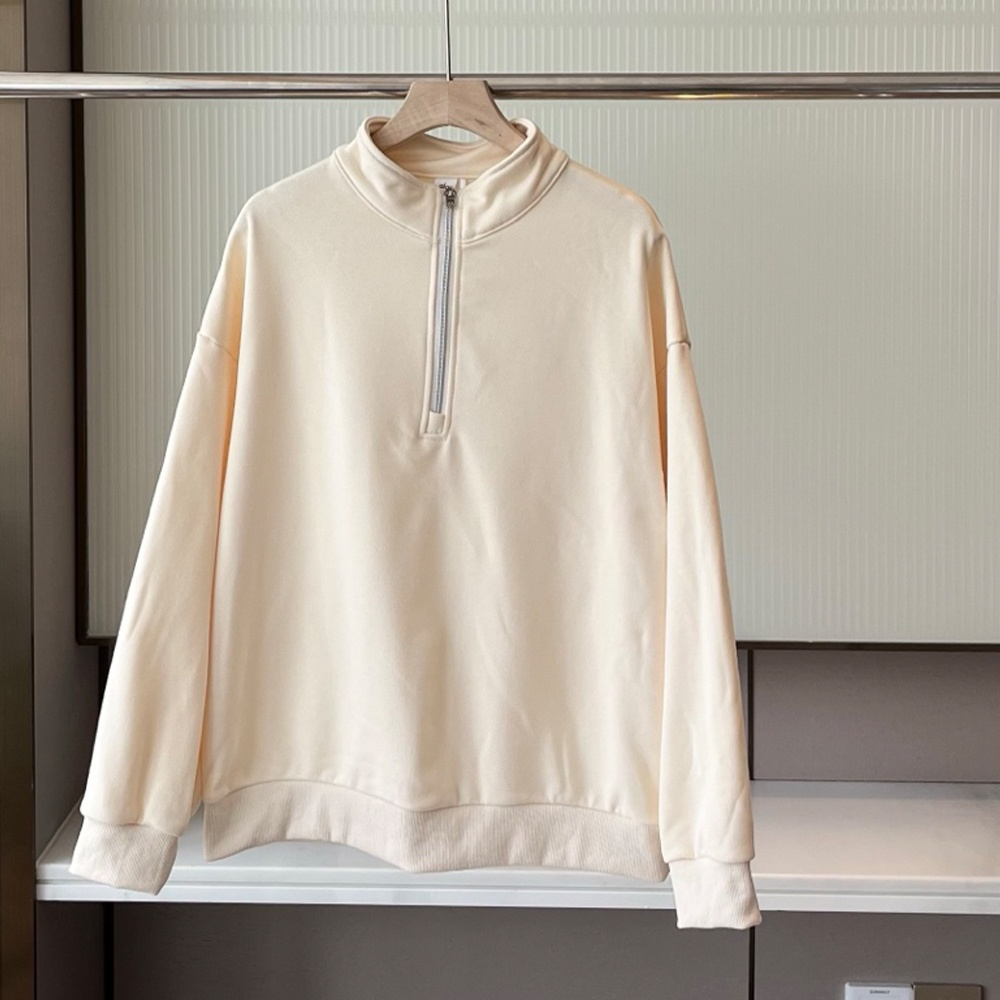Women's new loose sweater with stand-up collar and half zipper design