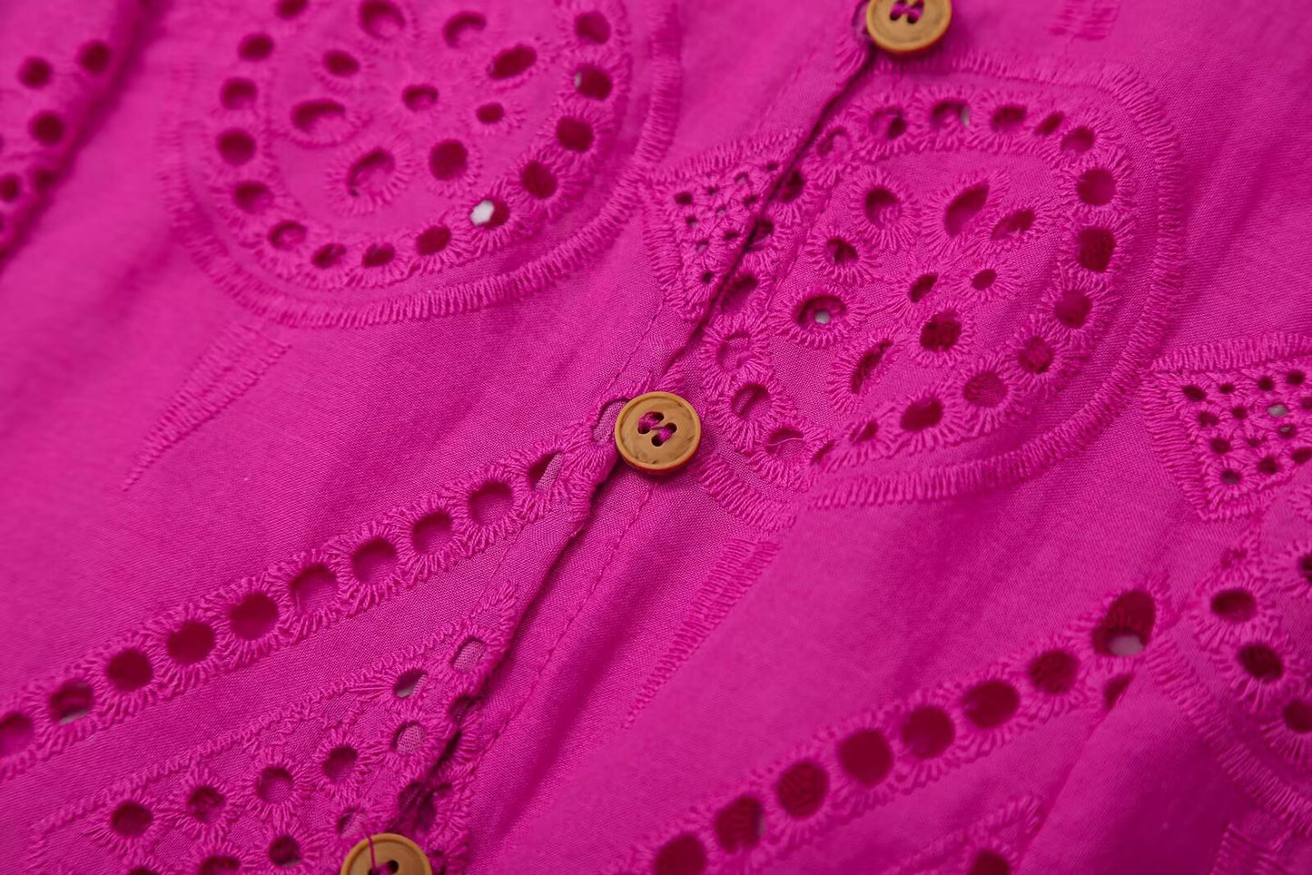 Women's short skirt style hemline hollowed out embroidery top