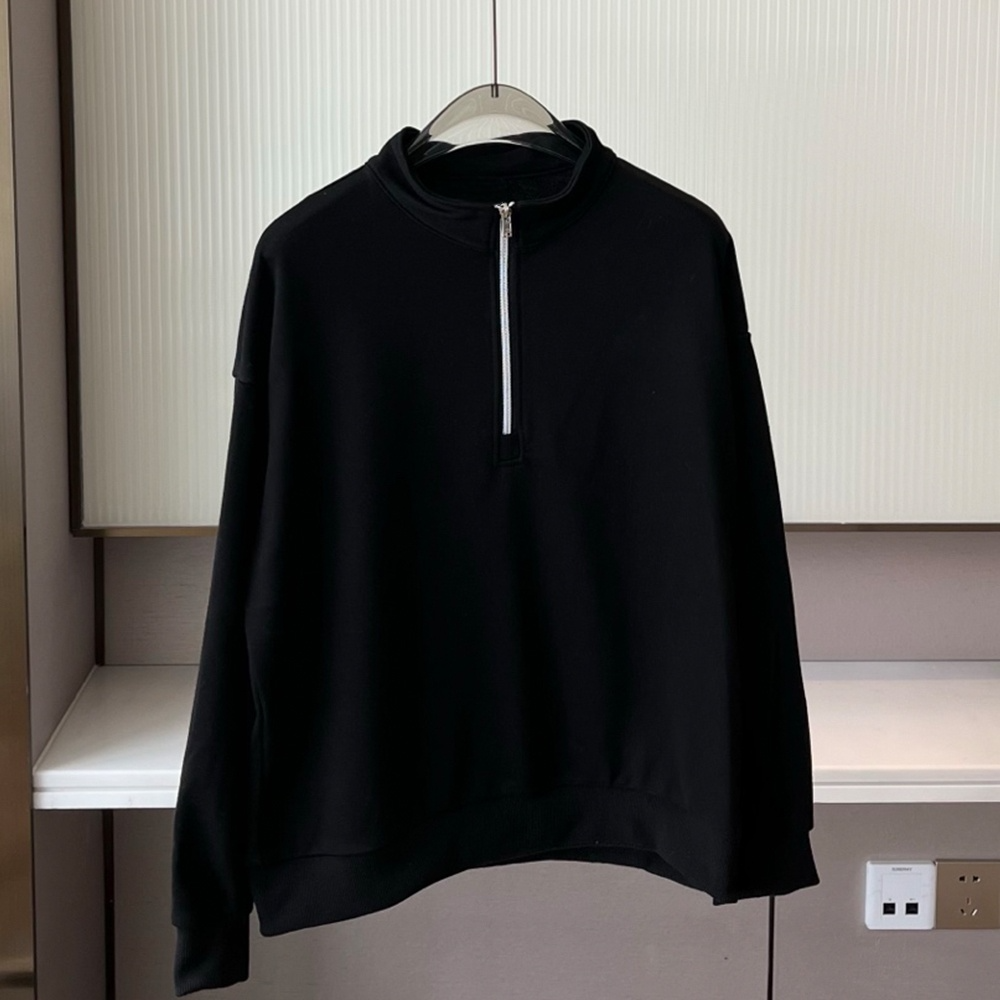Women's new loose sweater with stand-up collar and half zipper design
