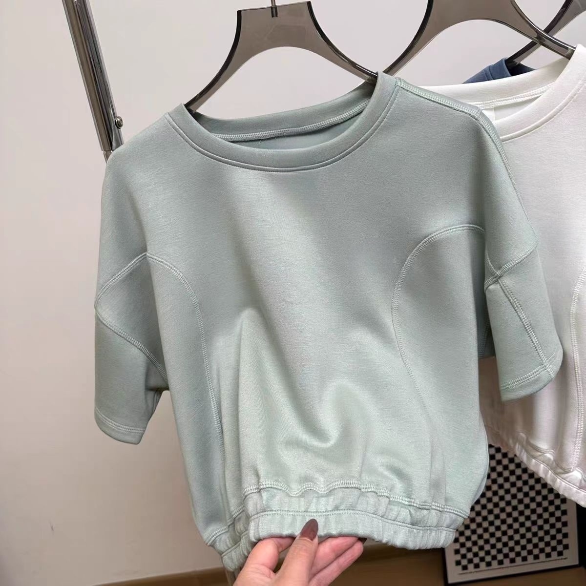 2026 women's new air yoga elastic hem navel short T-shirt